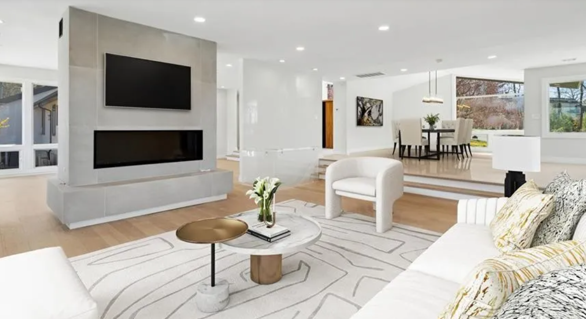 Modern living room with wide windows overlooking the landscape